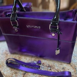 NWOT Younique purple tote/purse/travel makeup bag. Two available.